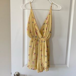 Bright yellow floral romper